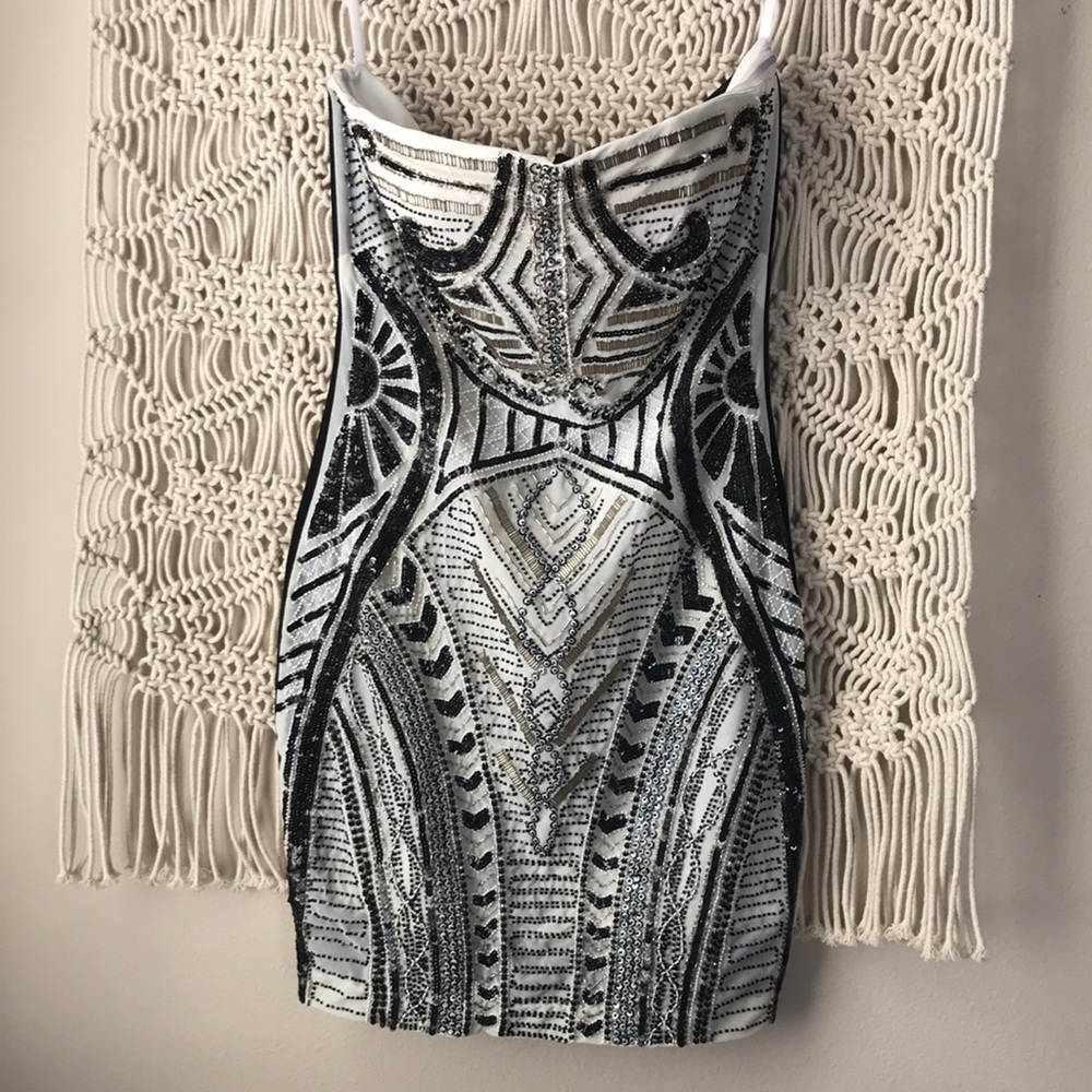 BEBE WHITE BEADED CORRINE STRAPLESS...  glass beaded & metal detailed mini dress